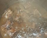 A picture of step 3 of Beef bones and pap.