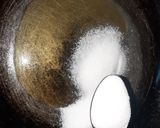 A picture of step 4 of Italian honey balls.