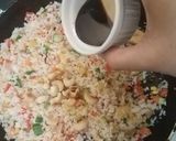 A picture of step 11 of Thai style fried rice with pineapple.
