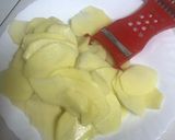 A picture of step 1 of Homemade Deep Fried Potato Crisps.