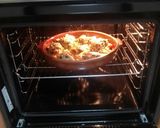 Foto del paso 6 de la receta Muslos de pollo con papas cocidas y menestra al horno