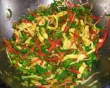 A picture of step 6 of Chinese fried rice.