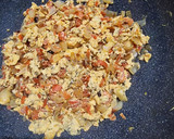 Foto del paso 3 de la receta: Huevos revueltos con tomate y cebolla