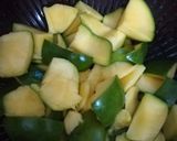 A picture of step 1 of Raw Mango vegetable (kacchi keri ka saag).