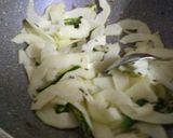 A picture of step 2 of Raw Papaya sambhara.