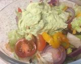 A picture of step 5 of Garlic Fried Lamb and an Advacado garlic sauce salad.