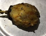 A picture of step 2 of Brinjal bharta.