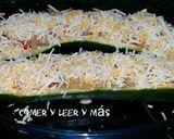Foto del paso 4 de la receta Calabacín relleno de pimientos del piquillo y champiñones