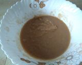A picture of step 7 of Banana nut cake with chocolate frosting.