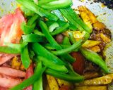 A picture of step 2 of Stir fried potatoes capsicum.