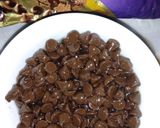 صورة لخطوة 1 من وصفة دارك شوكلت مع الفول السوداني وجوز الهند 🍫🥜🥥😋