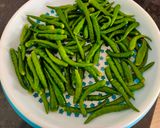 A picture of step 1 of Raita marcha / pickled green chillies.