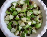 A picture of step 3 of ANZAC Apple Crumbles.