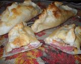 Foto del paso 8 de la receta: Empanadas salchicha, queso y tomate