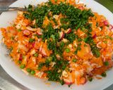 A picture of step 14 of Colorful Salad with White Rice, Carrots, Peas, Tomato, Radishes, and Cilantro.