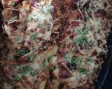 A picture of step 5 of Stuffed Zucchini Gratin in a Dutch Oven.