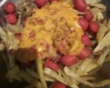 Foto del paso 7 de la receta: Papas fritas con cheddar panceta y salchichas