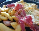 Foto del paso 6 de la receta Huevos rotos con jamón
