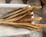 Foto del passaggio 5 della ricetta Grissini al Pesto di Agrumi