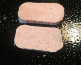 A picture of step 1 of Spam and Eggs on Toasted Bread.
