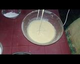 A picture of step 1 of Australian cake.. chocalate toping on vanilla cake.