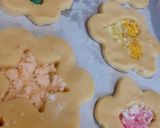 A picture of step 5 of Edible Christmas tree décor; stained glass windows biscuits.