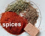 A picture of step 1 of Ghanaian vegetable Jollof rice with red seasoned chicken.