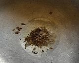 A picture of step 1 of Karnataka Special Rice Chitrana.