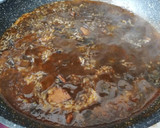 Foto del paso 3 de la receta: Arroz negro picante con calamares