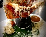 A picture of step 8 of Cone cheesy Masala Dosa with Coconut Tomato Curry.