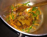 A picture of step 5 of Spicy tumeric rice with chicken strips.