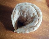 A picture of step 4 of Garlic flower bread.