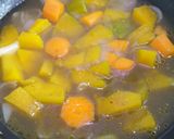 A picture of step 3 of Pumpkin and carrot soup.