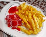 A picture of step 4 of Zig zag fun crunchy fries.
