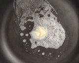 A picture of step 3 of Broccoli pasta in white garlic sauce.