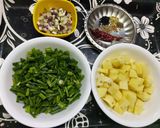A picture of step 1 of Potatoes with Green Onion.