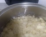 A picture of step 1 of Pasta in white sauce with garlic bread.