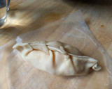 Foto del paso 3 de la receta: Empanadas de jamón y quesos para congelar