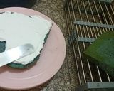 A picture of step 4 of 3 color cream cake.