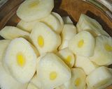 Foto del paso 2 de la receta Patatas confitadas al aroma de langostinos al ajillo