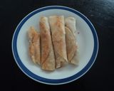 Foto del paso 4 de la receta: Enfrijoladas de hoja santa rellenas de guisado de flor de calabaza