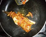 A picture of step 7 of Spicy grilled mackerel fish.