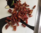 Une image de l'étape 3 de Salade de batavia rouge aux tomates séchées,olives multicolores et feta grecque.