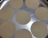 A picture of step 5 of Urad dal appalam or papad.