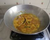 A picture of step 1 of Gujarati lunch (rasadar aloo sabji, amrakhand, puri, dal, rice).