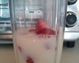 A picture of step 2 of Strawberry and banana smoothie.