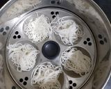 A picture of step 4 of Thengai Paal Idiyappam(Rice noodels with Jaggery,coconut syrup.