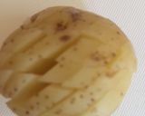 A picture of step 1 of Hedgehog Potatoes.