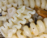Foto del paso 5 de la receta: Riccioli, con ajo, guindilla y olivas negras
