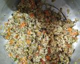 A picture of step 2 of Carrot daliya.